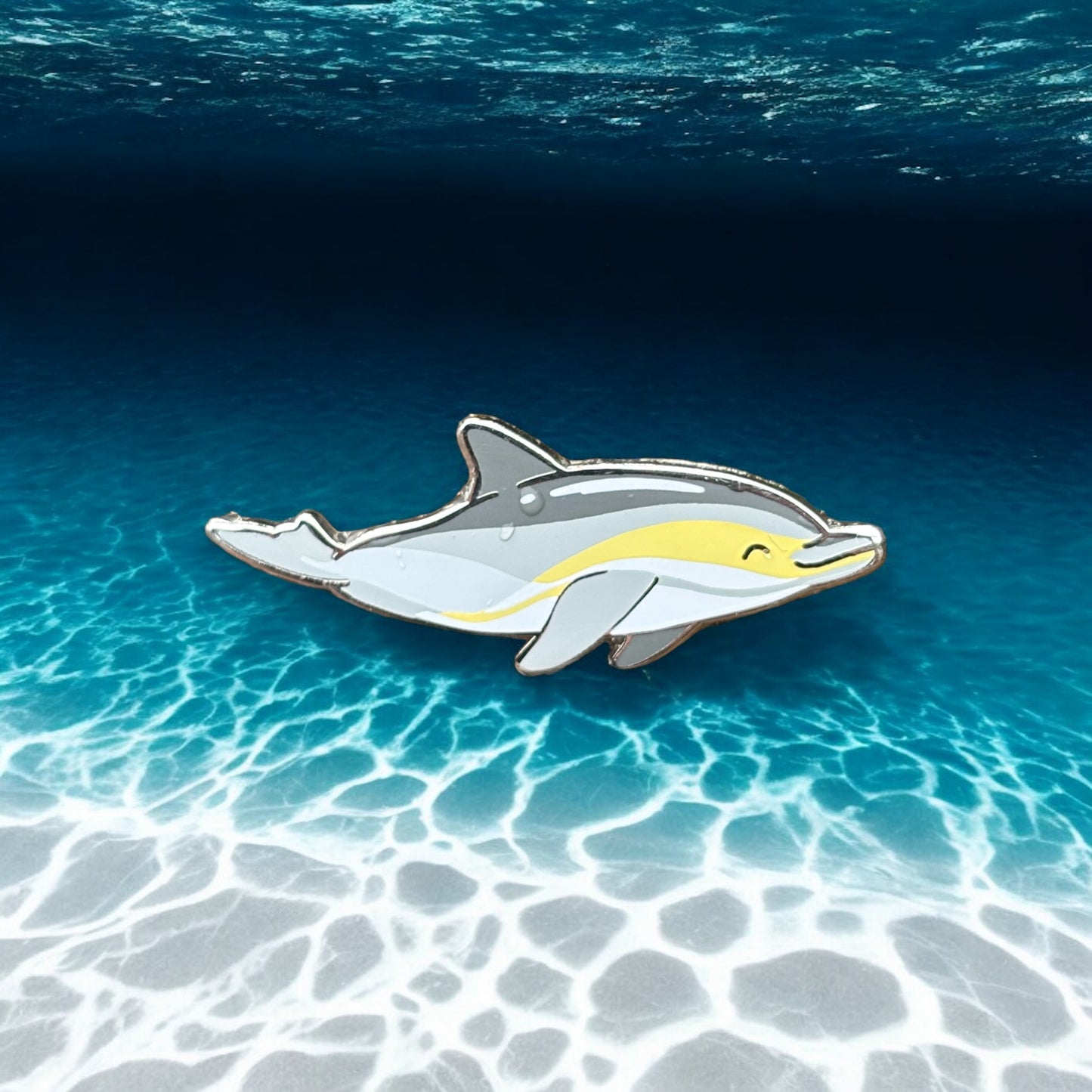 Common dolphin enamel pin