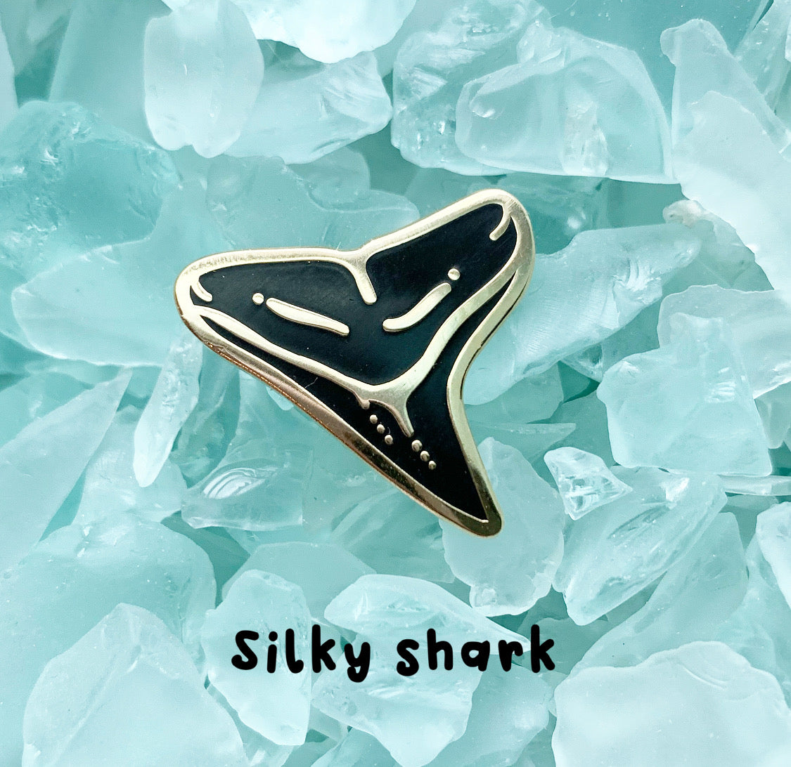 shark tooth ii enamel pins • donation to saving the blue silky shark tooth (1 pin)