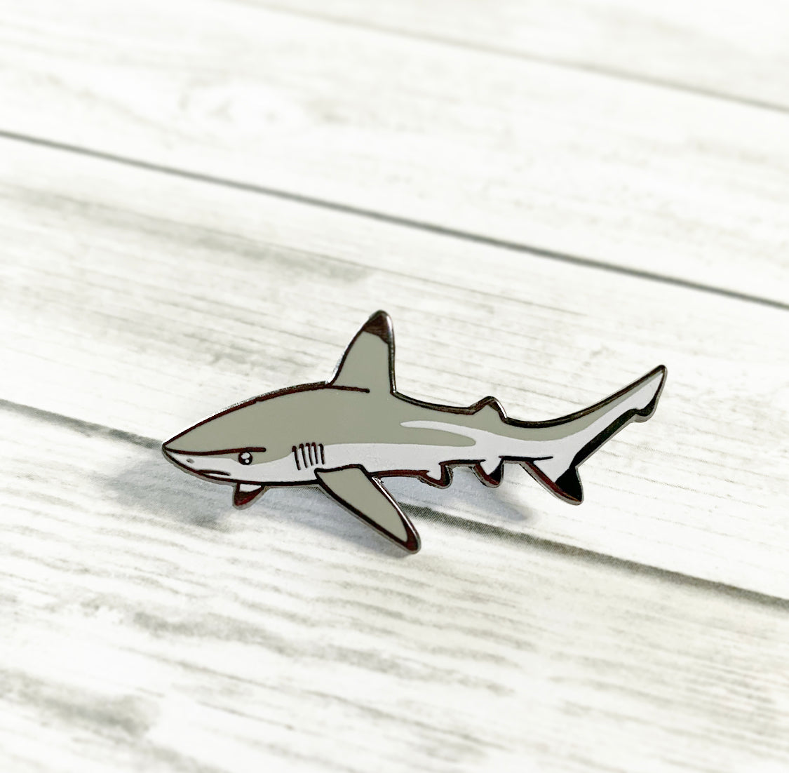 blacktip reef shark enamel pin